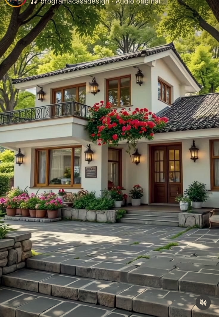 The Mein Villa — stone-and-stucco home with mountain backdrop in Itanagar, Arunachal Pradesh
